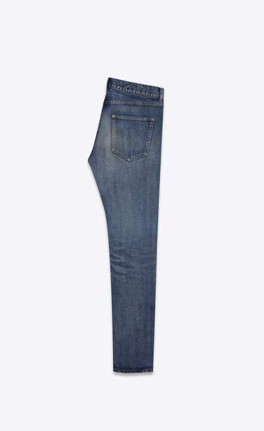 Low-waisted skinny jeans in faded blue denim